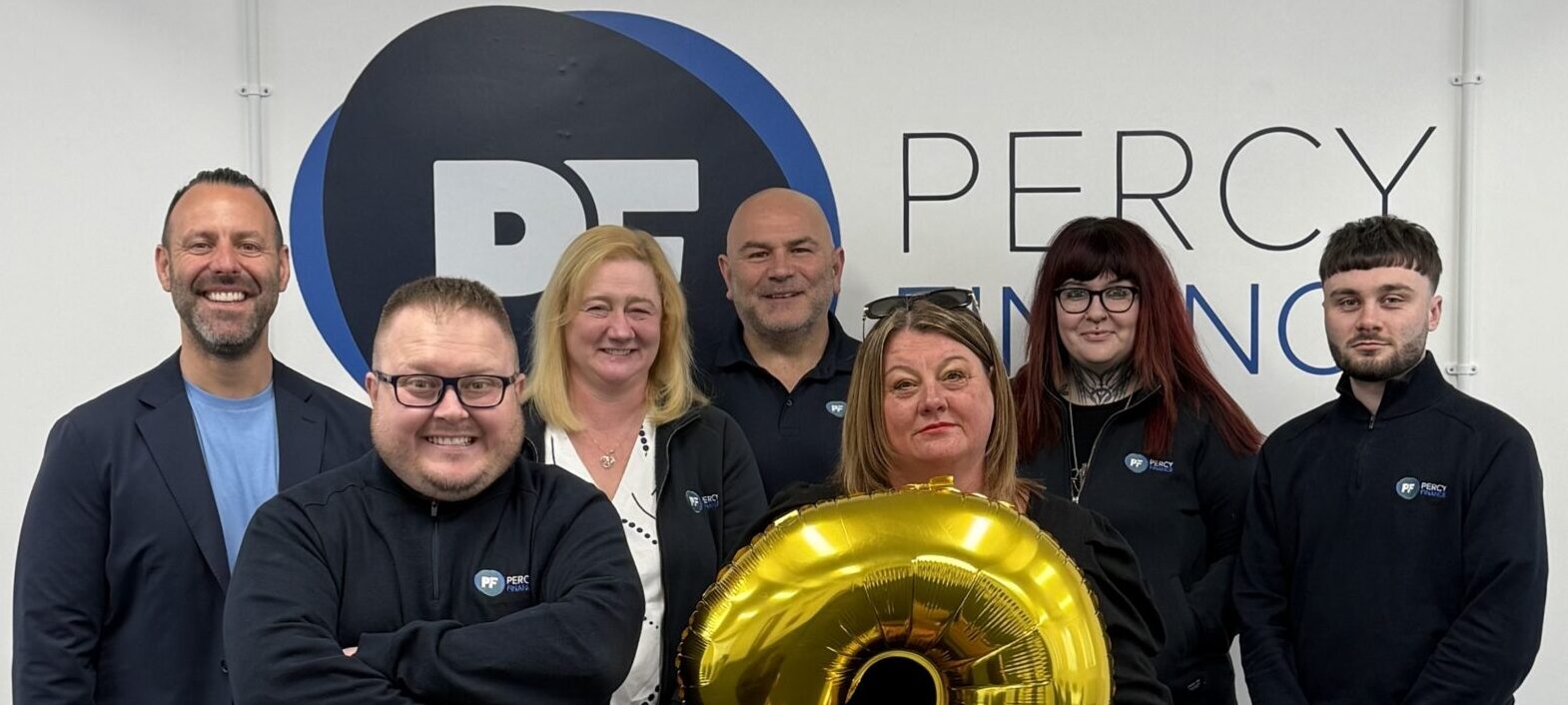 Asset finance driving business growth – trucks on the road, excavator, business handshake, and modern skyscrapers. Flexible funding solutions for expansion.